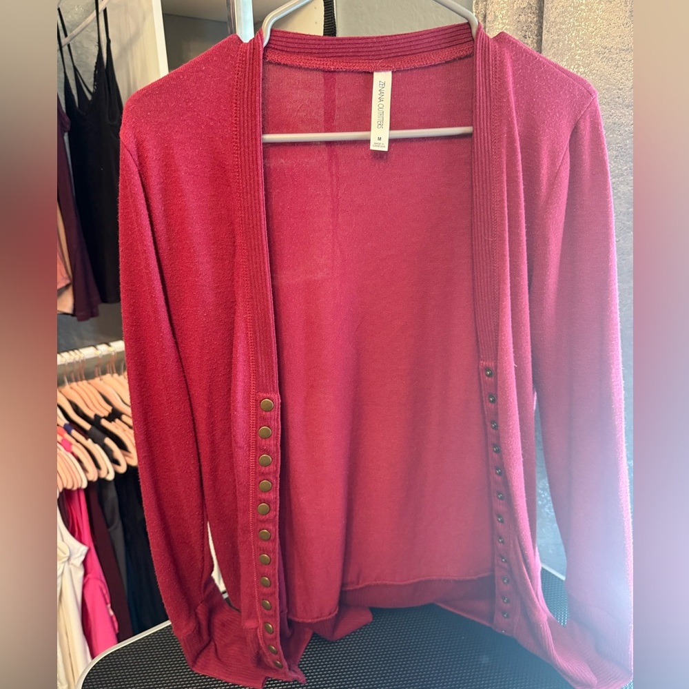Red sweater size M